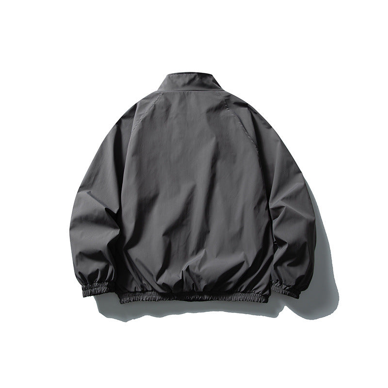 Unisex Lightweight water-repellent windbreaker with stand-up collar, raglan sleeves, and elastic hem Chichicherry