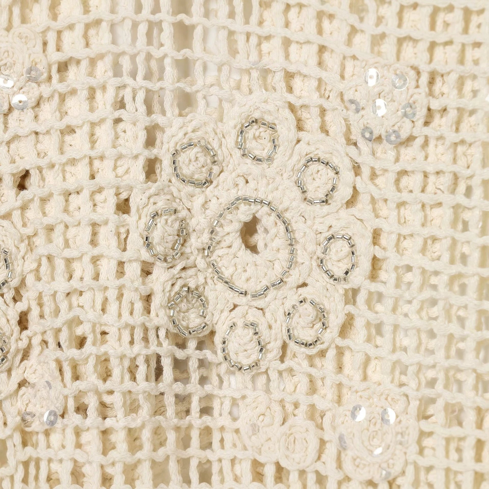 Women's crochet sweater with flower appliqués and drawstring Chichicherry