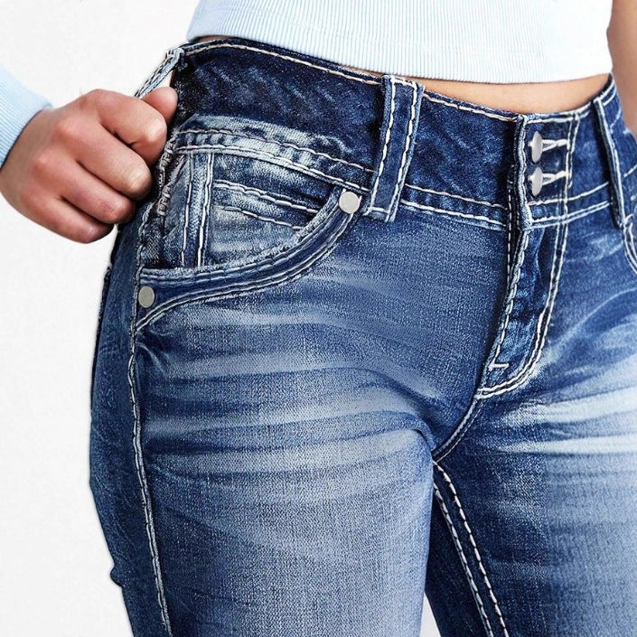 Women's high-waisted bootcut jeans with shaping waistband and visible button placket Chichicherry