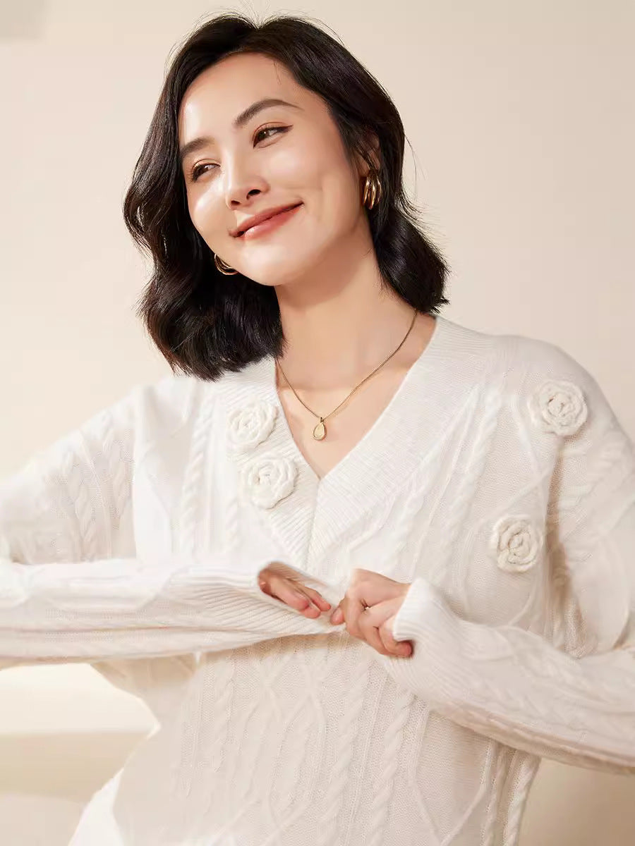 Women's cable knit V-neck sweater with three-dimensional floral appliqués made from soft wool blend Chichicherry