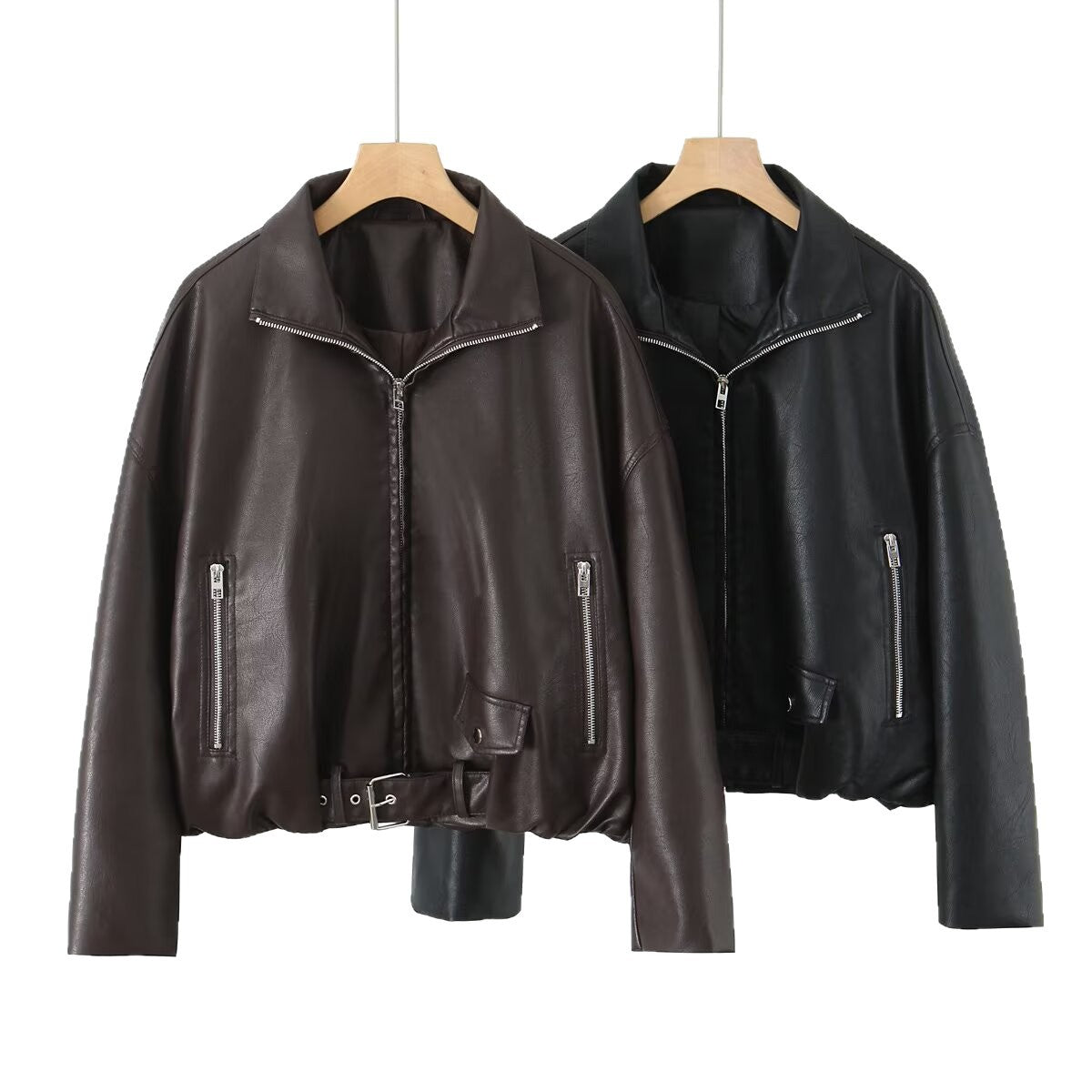 Women’s cropped oversized leather jacket in bomber style with zippered pockets and waist belt Chichicherry