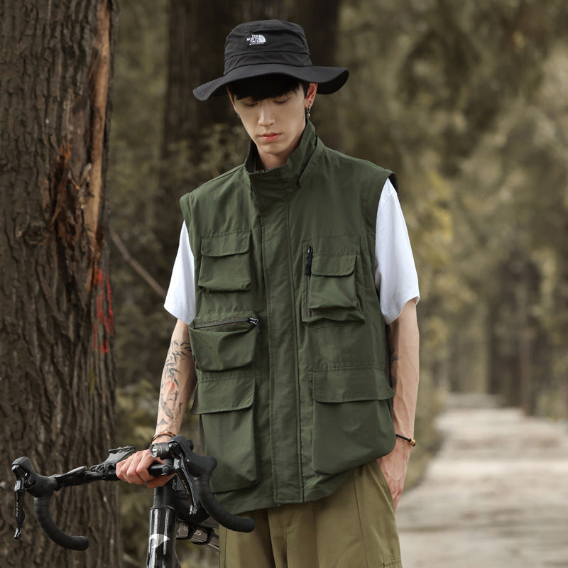 Men's lightweight multifunctional field jacket with numerous utility pockets and ventilation details Chichicherry