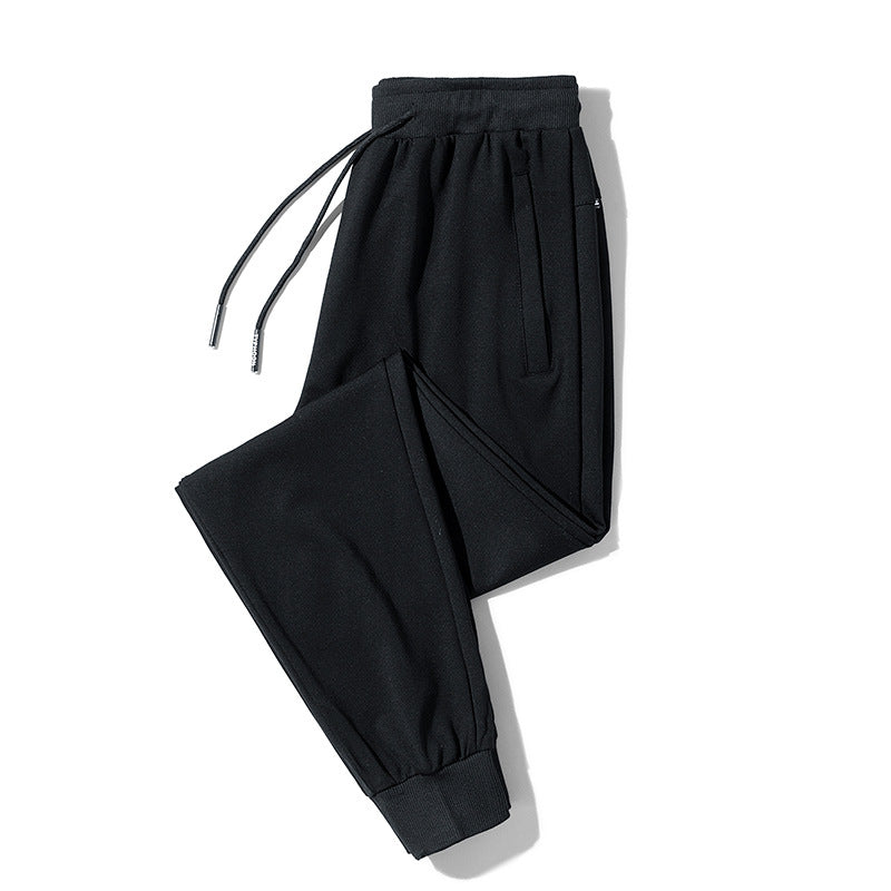 Men's fleece jogging pants with drawstring, zippered pockets, and elastic cuffs Chichicherry