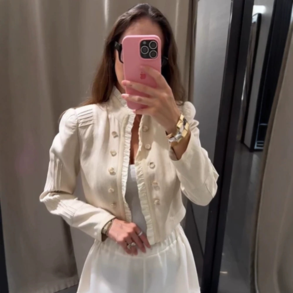 Women's cropped jacket with ruffle trim, puff sleeves, and double-breasted button placket Chichicherry