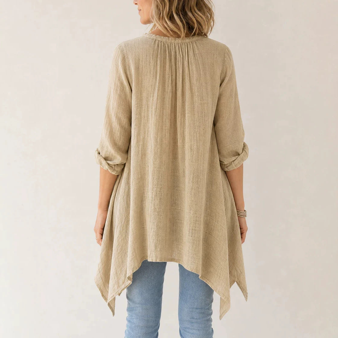 Women's Casual Tunic Blouse with Asymmetrical Hem, Fine Waffle Structure and Box Pleats