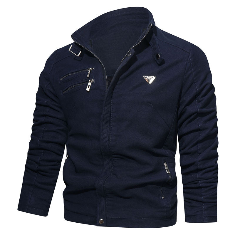 Men's lightweight canvas utility blouson with stand-up collar, asymmetrical chest zip section, and decorative zippers.
