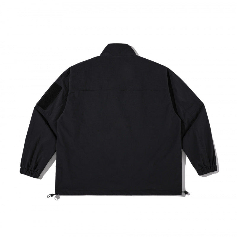 Unisex Lightweight Technical-Utility Jacket with Stand Collar, Zipper Pockets and Drawstring Hem Chichicherry