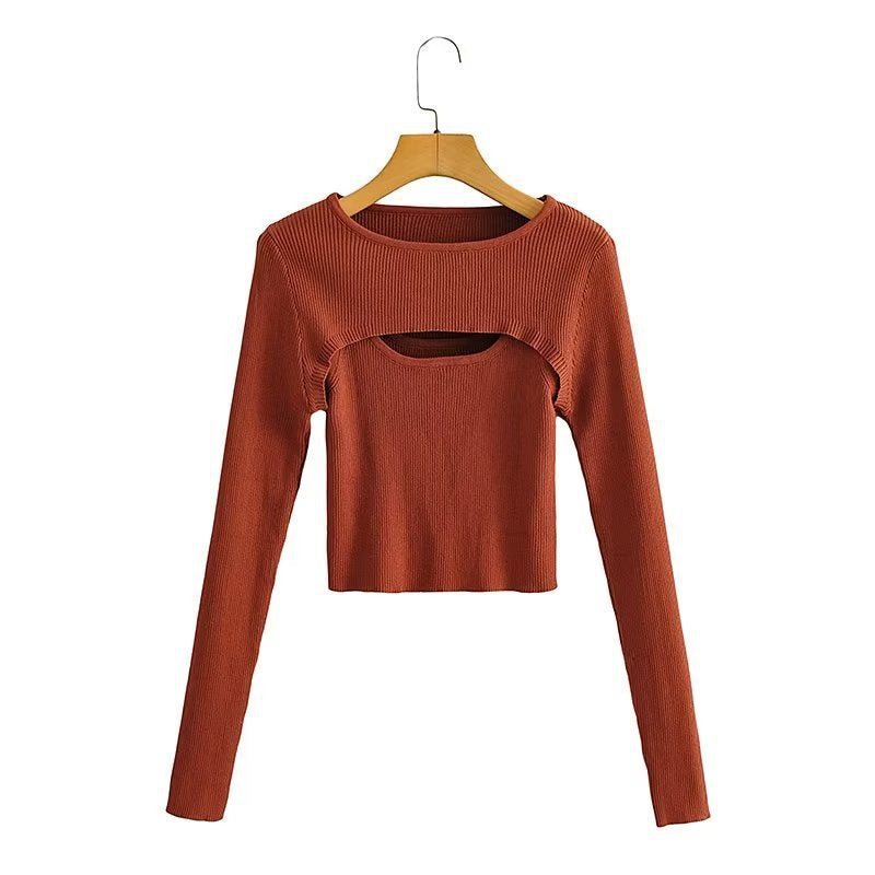 Women short cut ribbed knit top with asymmetric cut-outs and round neckline Chichicherry