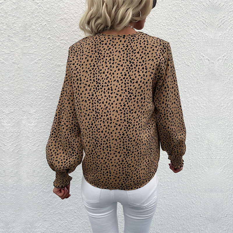 Women's lightweight blouse with V-neck, continuous button placket, and ruffled cuffs Chichicherry