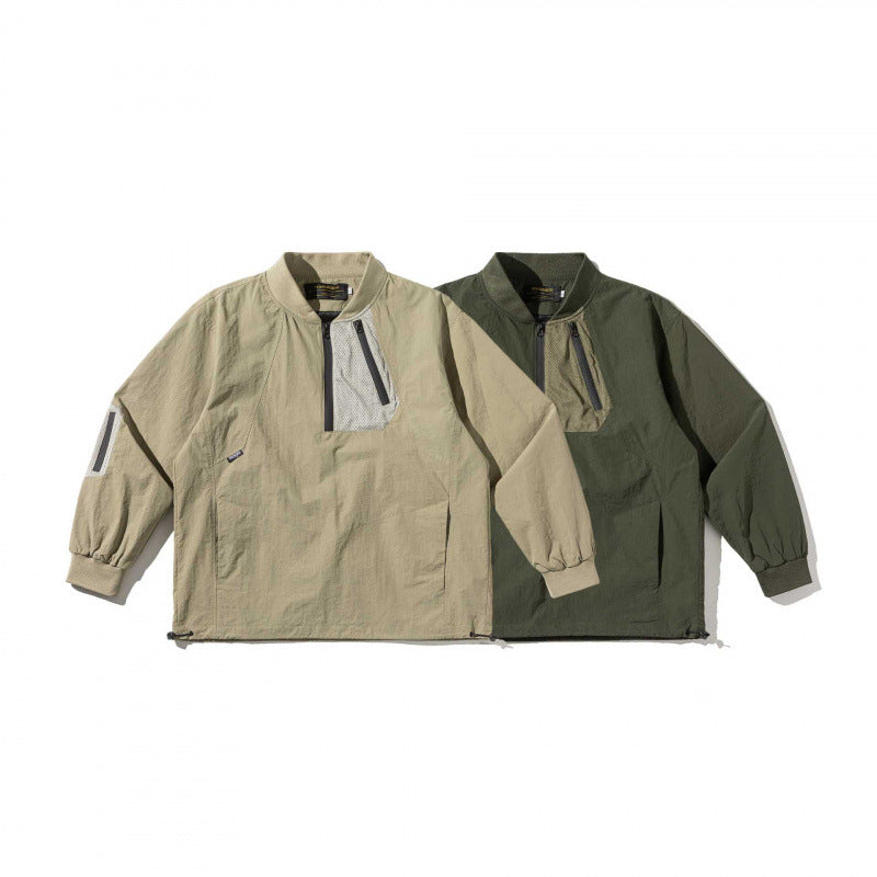 Unisex Lightweight Oversized Anorak with Half Zipper, Utility Pockets and Drawstring Hem Chichicherry