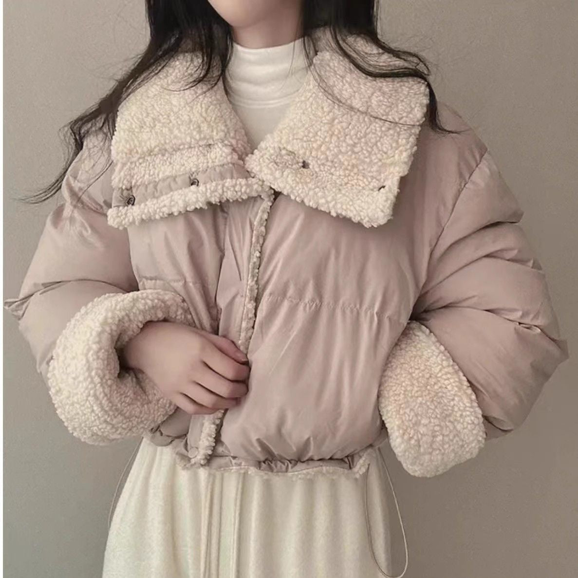 Women's short quilted puffer jacket with teddy collar, roll-up sleeves, and drawstring hem Chichicherry