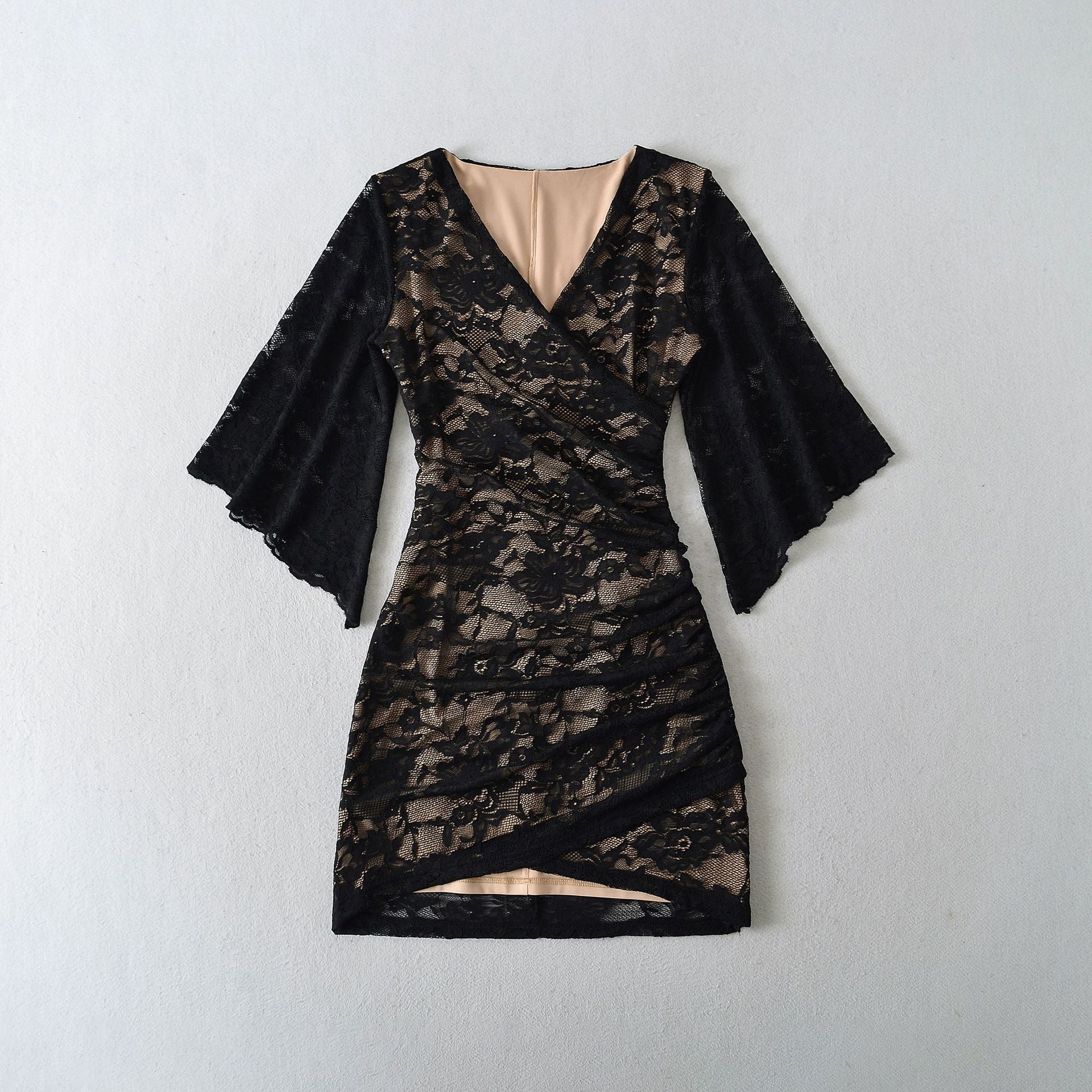 Women's lace wrap dress with trumpet sleeves and gathered silhouette Chichicherry