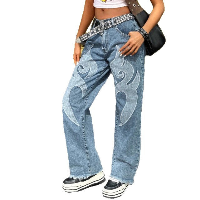 Women wide denim jeans with tribal appliqué, raw hem and relaxed fit Chichicherry