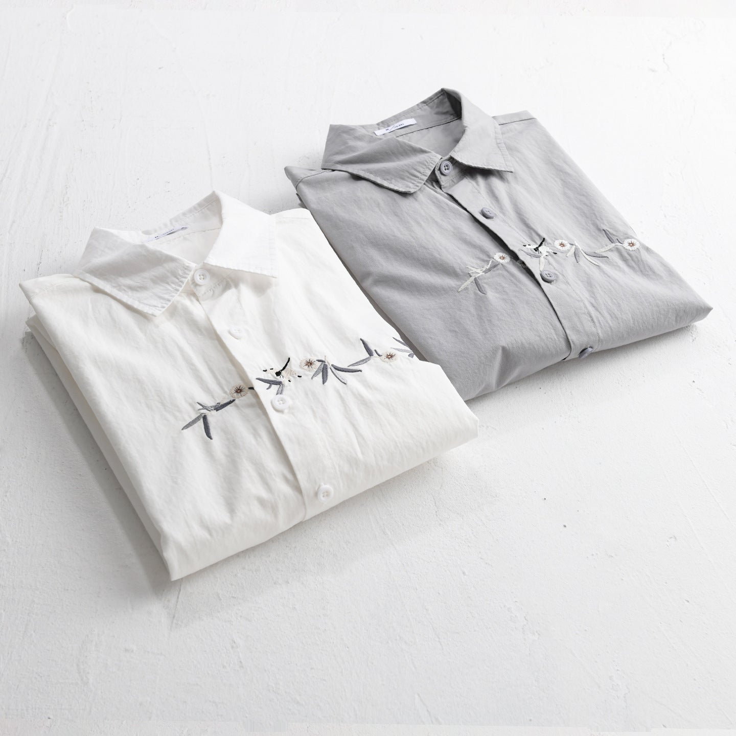 Women's loose embroidered cotton overshirt with kent collar and layering detail Chichicherry