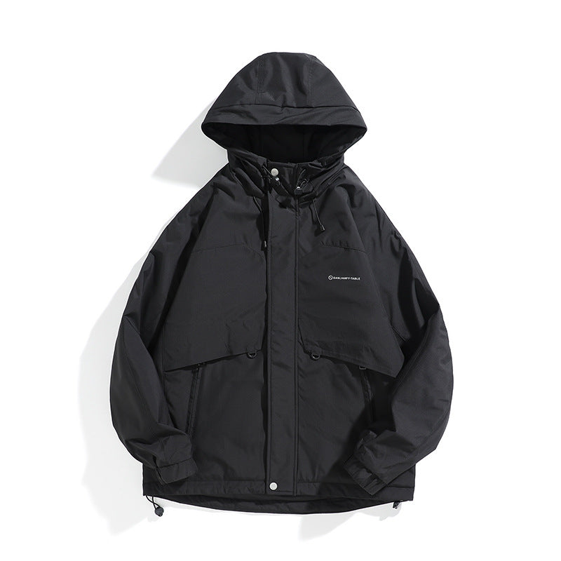 Unisex Wide cut weatherproof parka with hood, drawstring and patch pockets Chichicherry