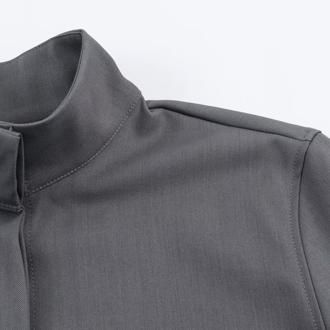 Women's loose-fitting tunic blouse with concealed button placket and stand-up collar Chichicherry