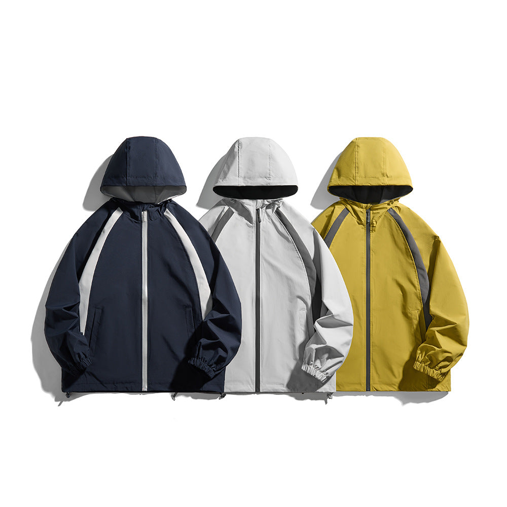 Men's hooded windbreaker in sporty color block design with adjustable hem Chichicherry