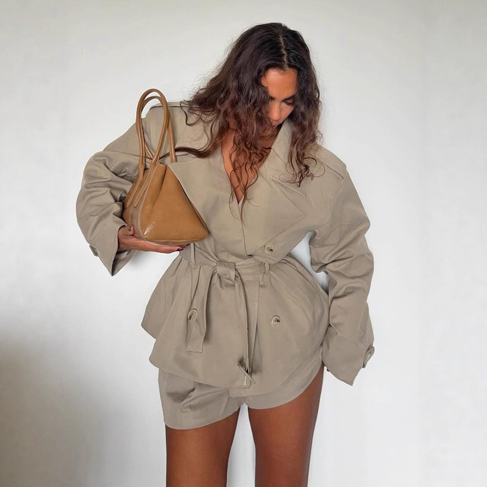 Women's short trench-style jacket with a tailored tie belt and wide sleeves Chichicherry