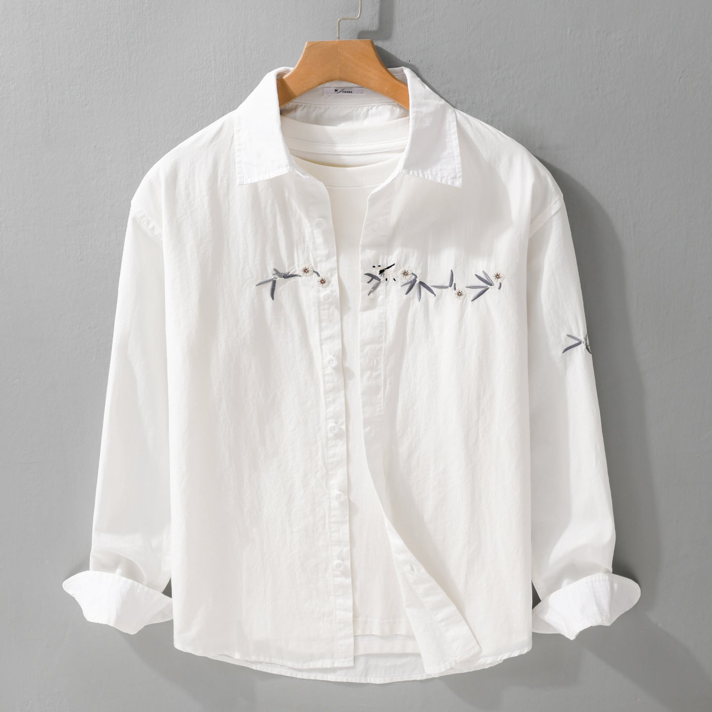 Women's loose embroidered cotton overshirt with kent collar and layering detail Chichicherry