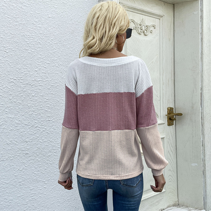 Women's yarn-structured color block pullover with V-neck and decorative button placket Chichicherry