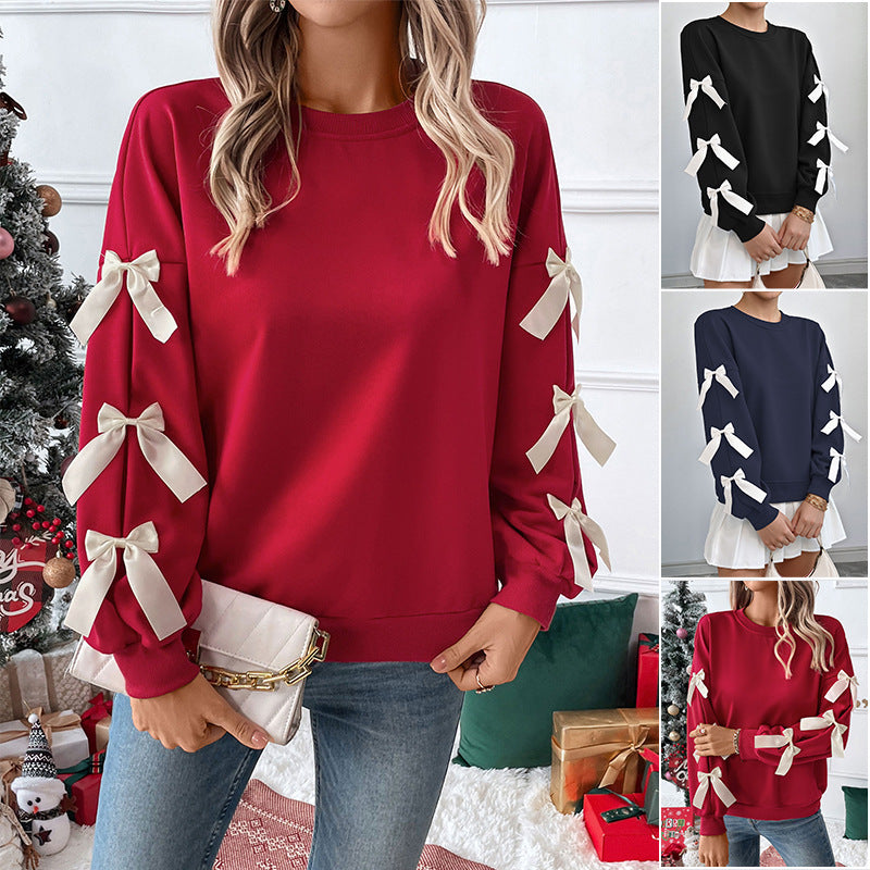 Women's sweatshirt with decorative bows on the sleeves Chichicherry