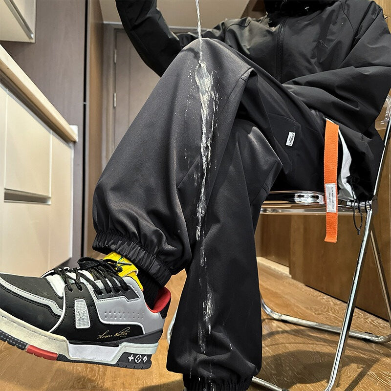 Men's Water-Repellent Tech Jogging Pants with Elastic Hem, Drawstring, and Durable Seams Chichicherry