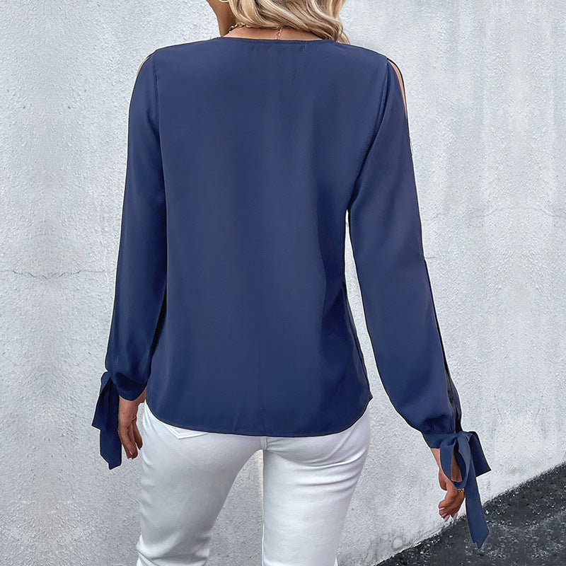Women's voile blouse with V-neck, lace yoke, sleeve slits, and bow cuffs Chichicherry