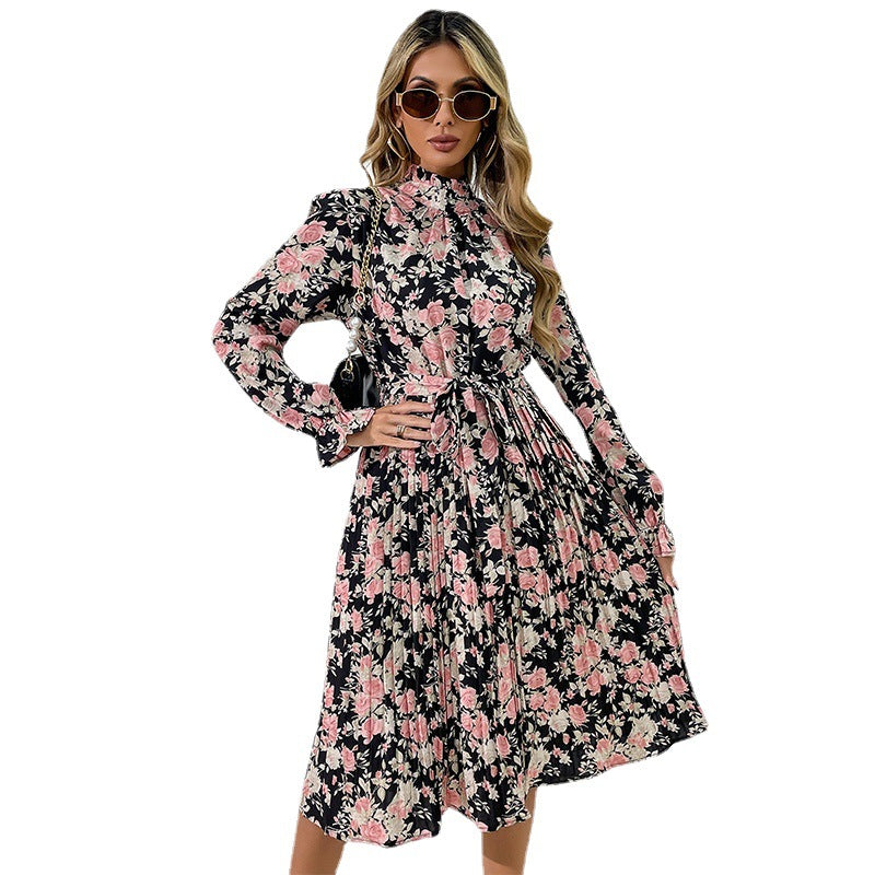 Women's midi dress with floral print, pleated skirt, stand collar, and tie belt Chichicherry