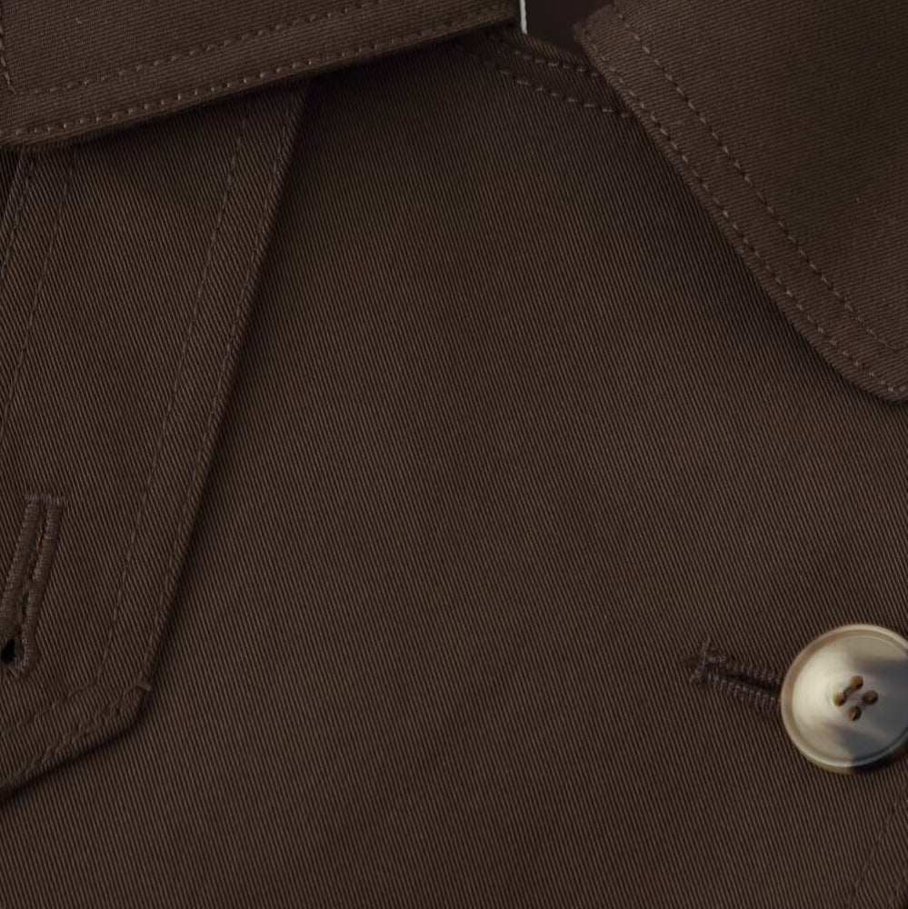 Women's short trench-style jacket with tie belt, raglan sleeves, and tailored fit Chichicherry