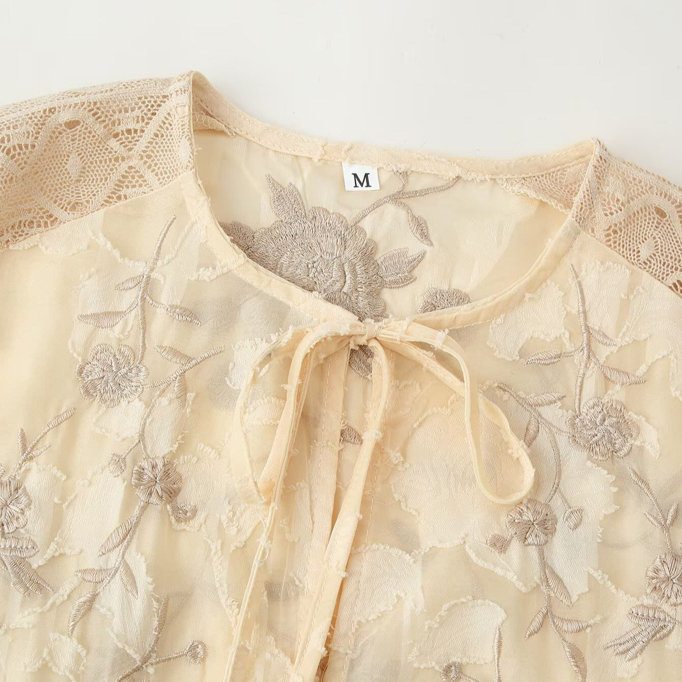 Women's Transparent Knitted Lace Blouse with Tie Bow, Crochet Edge and Fringe Hem Chichicherry