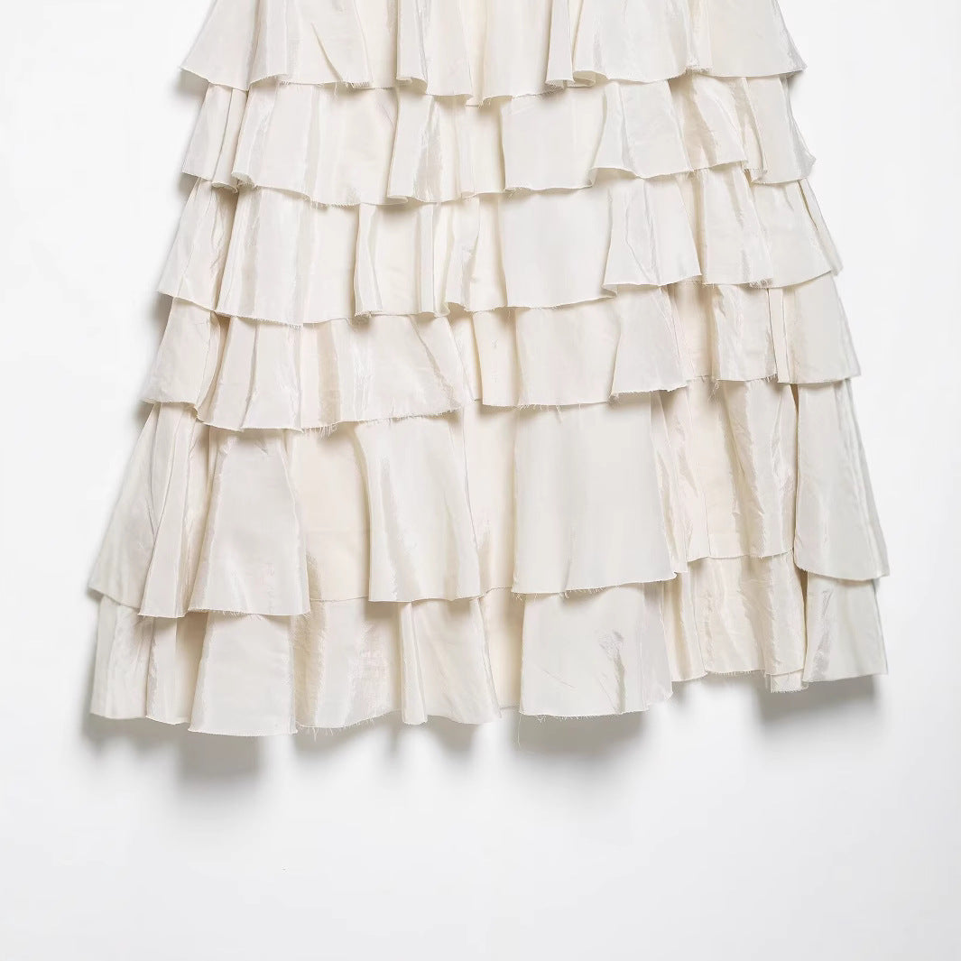 Women's tiered midi skirt with ruffles, elastic gathered waistband, and flowing satin look Chichicherry