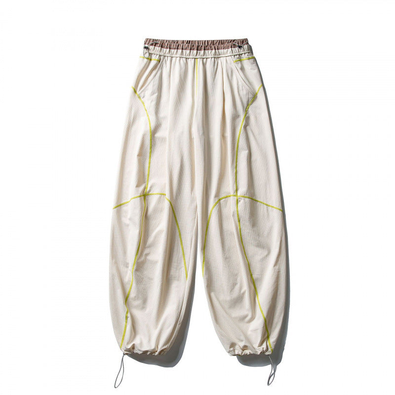 Unisex locker cut tech jogging pants with elastic waistband, distinctive flatlock seams and drawstring Chichicherry