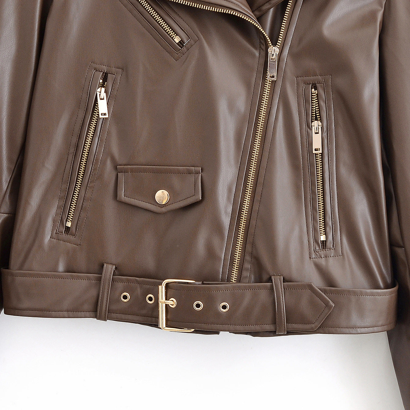 Women's biker jacket made of faux leather with asymmetrical zipper, waist belt, and gold-colored details Chichicherry