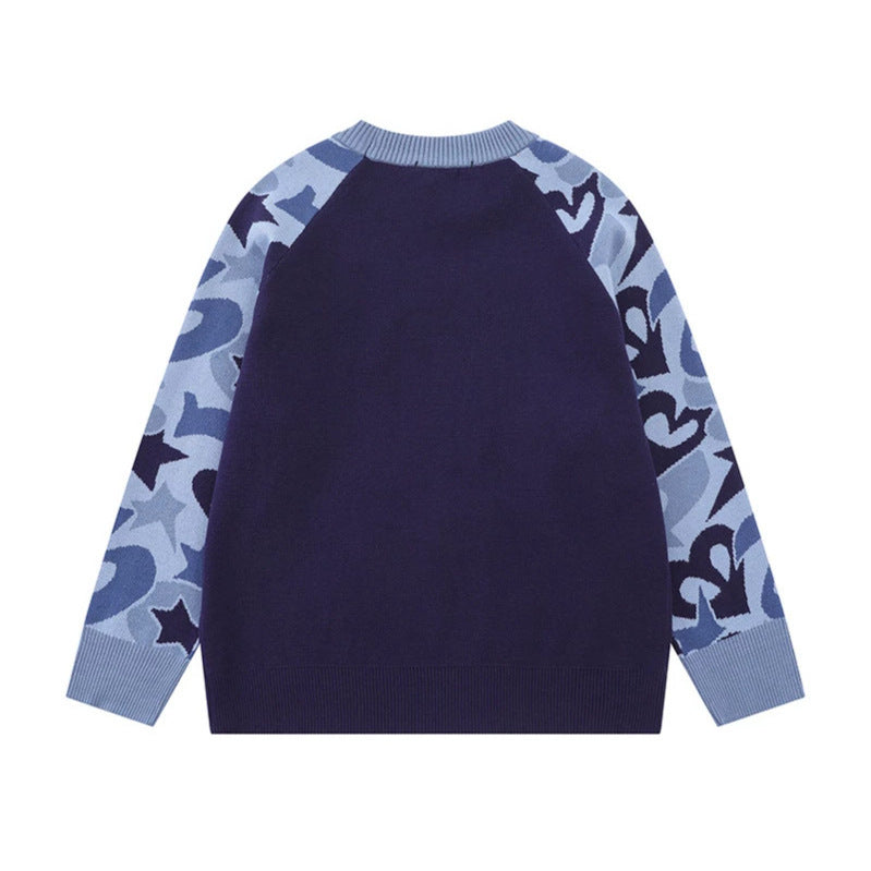 Women's knit sweater with raglan sleeves, statement jacquard sleeves, and ribbed hem Chichicherry