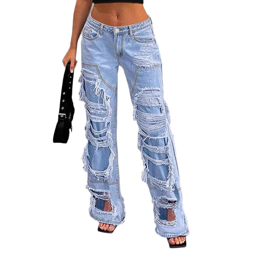 Women high-cut heavily ripped denim jeans with wide leg and decorative seam panels Chichicherry