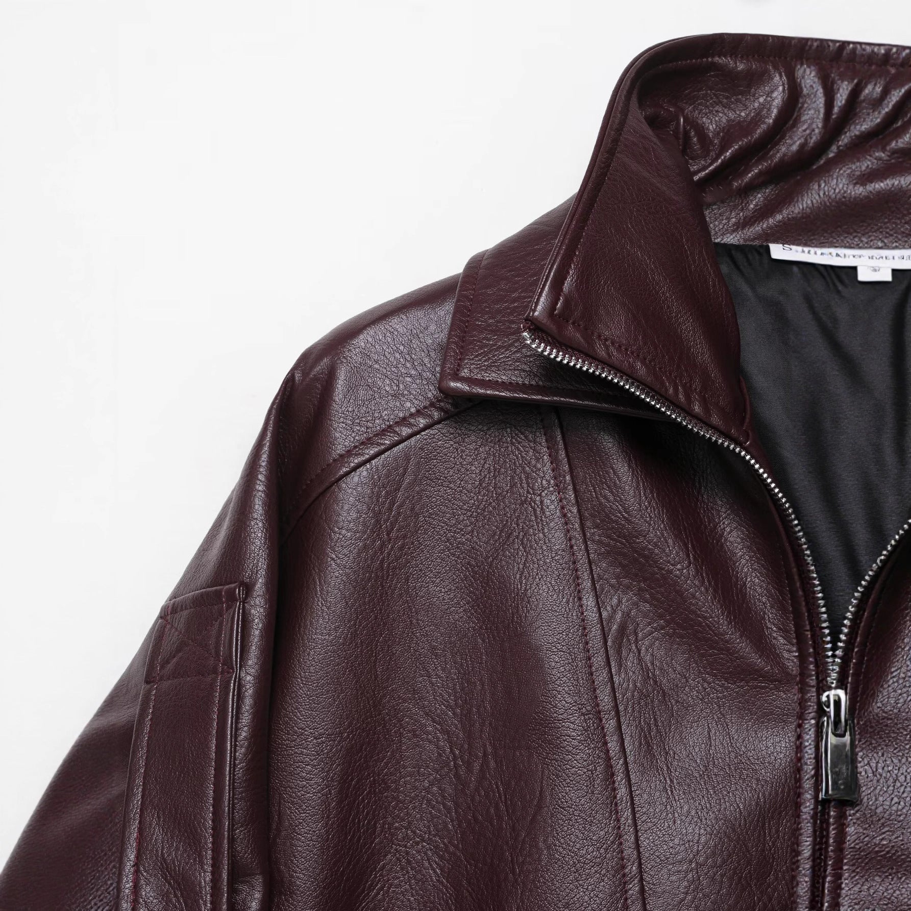 Women Oversized Leather Jacket in Bomber Style with Waist Belt Chichicherry