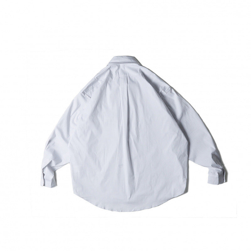 Unisex Oversize-checkered Shirt with rounded hem and appliquéd chest pockets Chichicherry