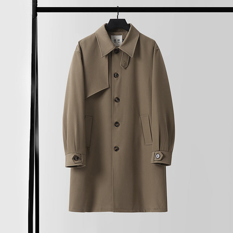 Men's modern minimalist trench coat with asymmetric shoulder flap and knee-length silhouette Chichicherry