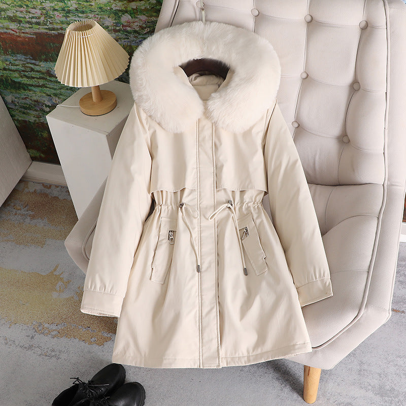 Women's mid-length water-repellent parka with voluminous faux fur collar, waistband drawstring, and multifunctional flap pockets Chichicherry