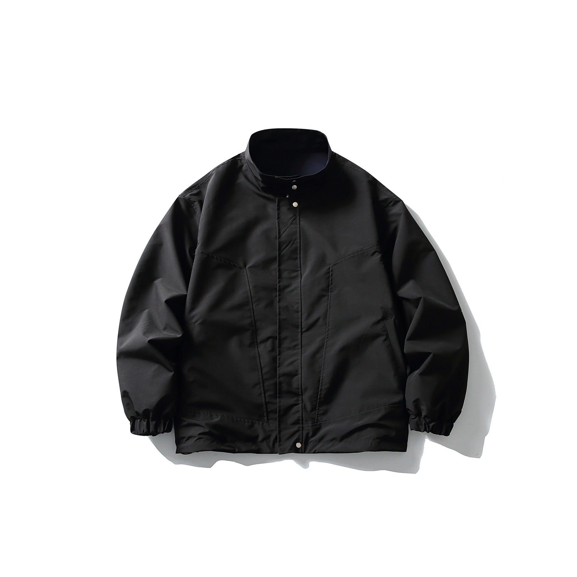 Unisex Lightweight wind and water-repellent oversized boxy jacket with stand-up collar and elastic hem Chichicherry