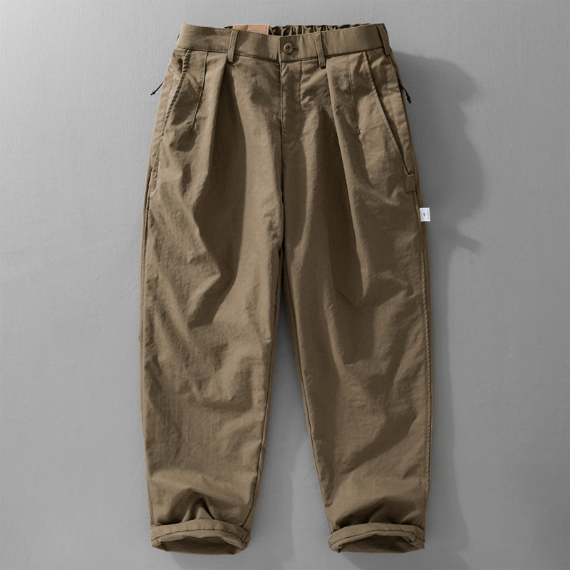Men's wide pleated chino pants with drawstring waistband and tapered leg Chichicherry