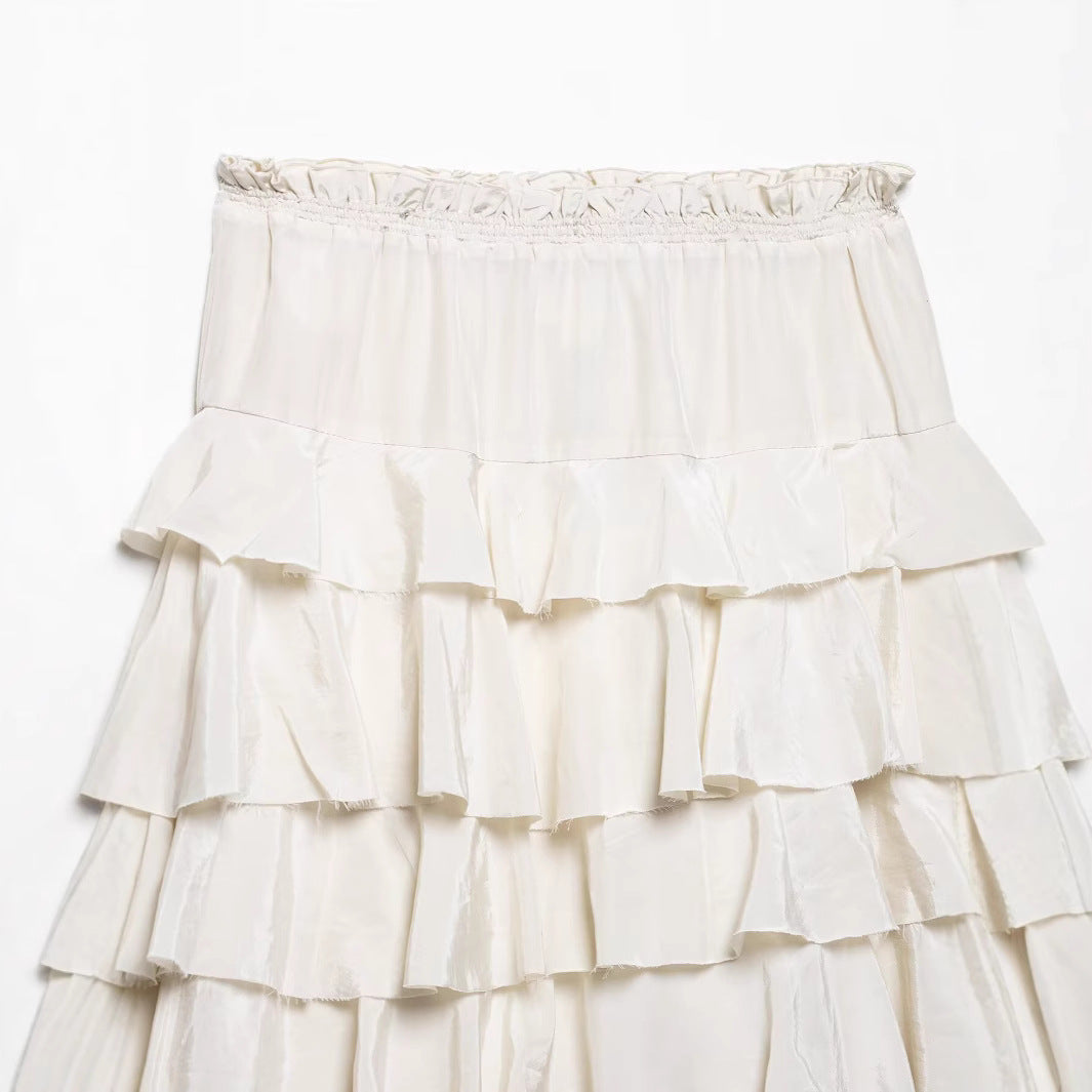 Women's tiered midi skirt with ruffles, elastic gathered waistband, and flowing satin look Chichicherry