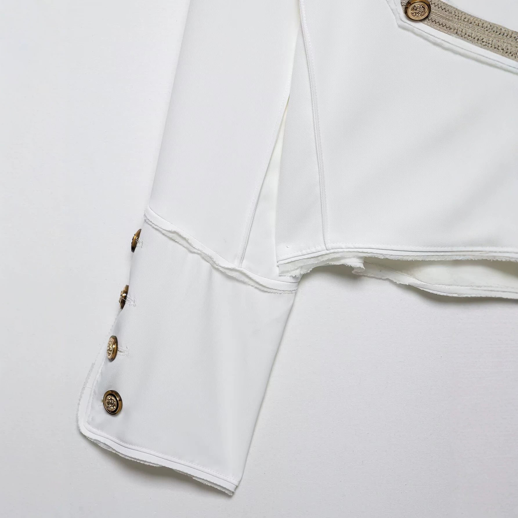 Ladies short jacket in military style with asymmetrical decorative strip, shoulder epaulettes and gold buttons Chichicherry