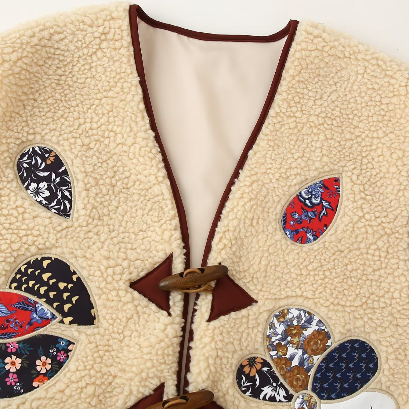 Ladies Padded Teddy Vest with Patchwork Applications and Toggle Closures Chichicherry