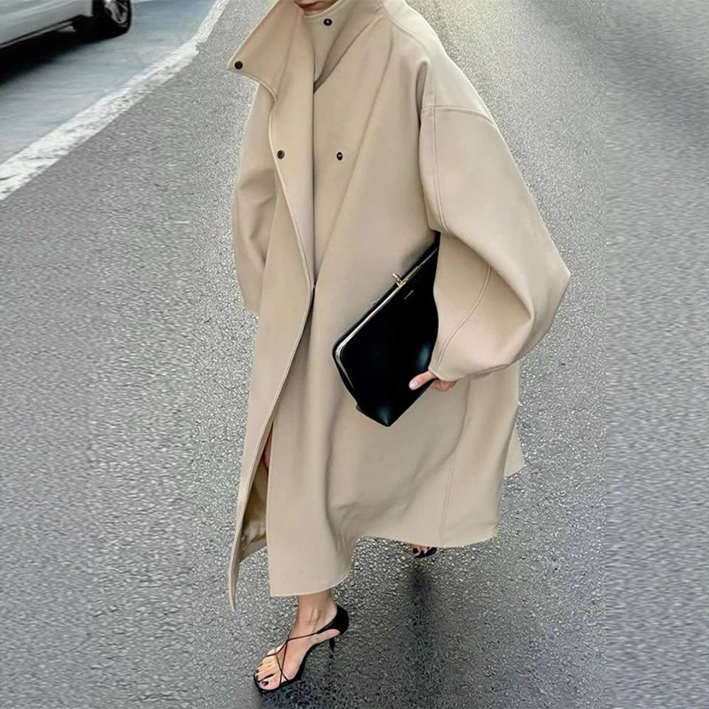 Ladies coat in minimalist midi cut with stand-up collar and concealed button placket Chichicherry