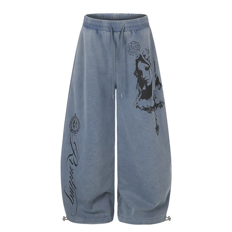 Women's extra-wide palazzo harem pants made of sweatshirt fabric with a high comfort waistband, drawstring, and large graphic print Chichicherry