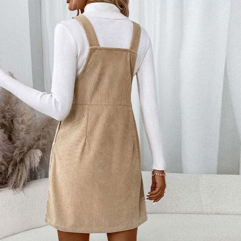 Women's corduroy bib dress with adjustable straps, patch chest pocket, and side button placket Chichicherry