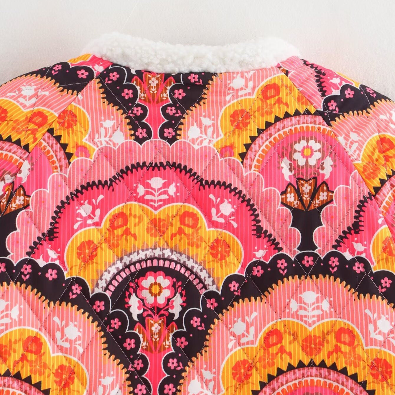 Women quilted jacket with teddy lining and retro-inspired allover print Chichicherry