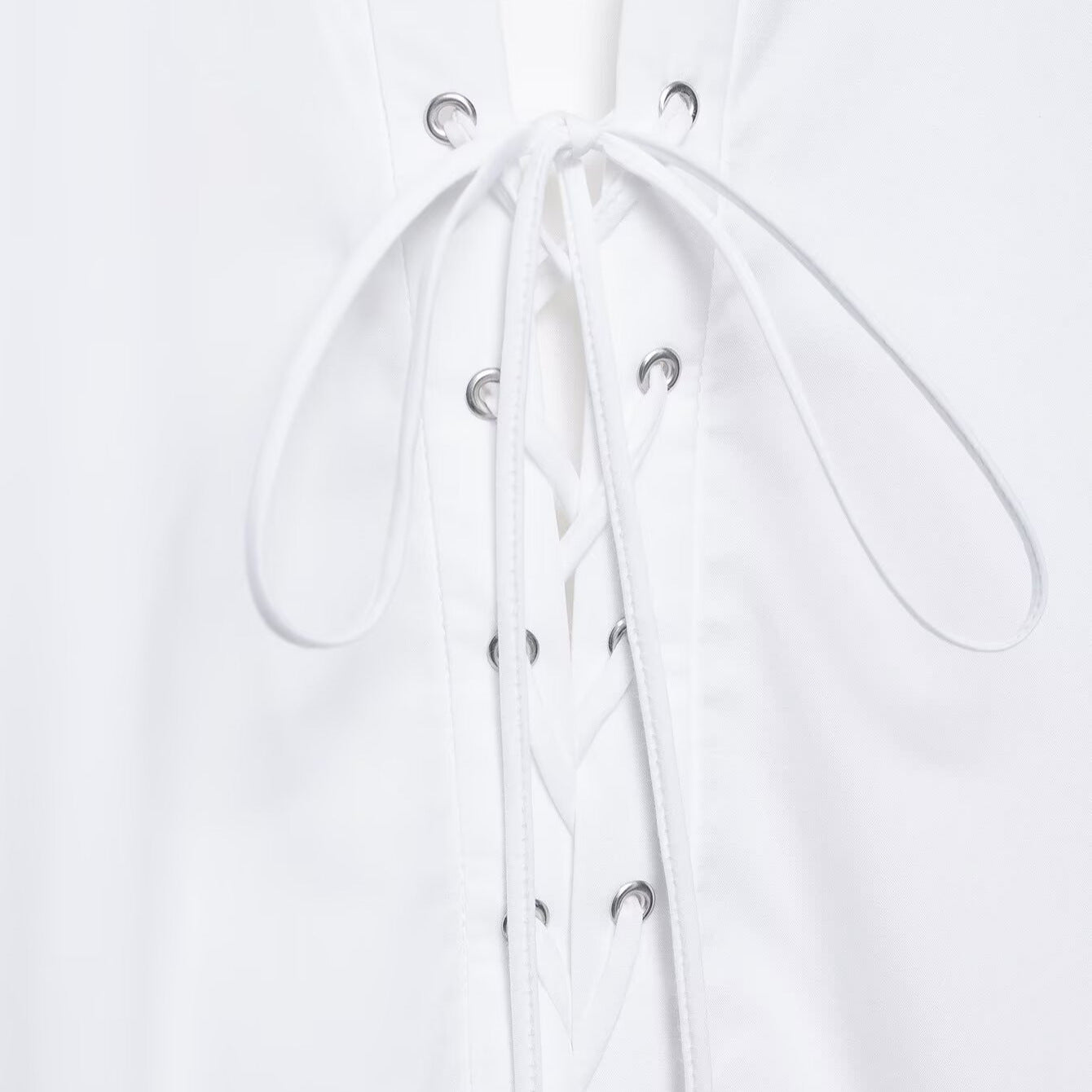 Women's oversized shirt blouse with lace-up closure and extended cuffs Chichicherry