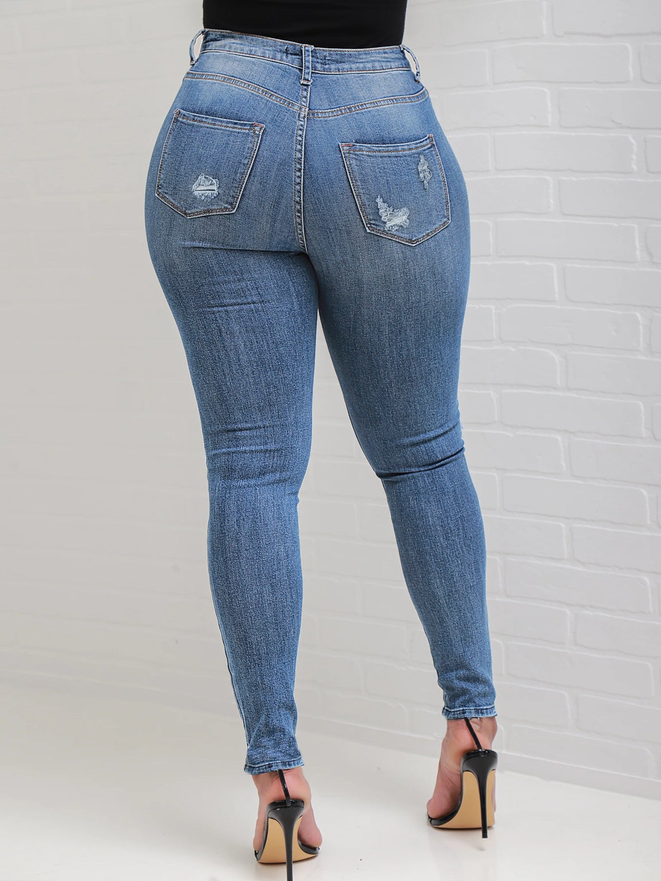 Women High-Waisted Sculpting Skinny Jeans with Visible Button Placket and Subtle Destroyed Detail Chichicherry